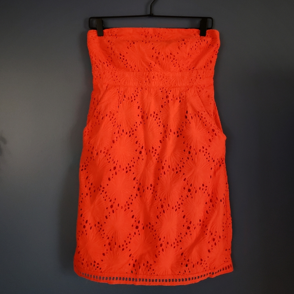 Dark orange strapless dress with pockets